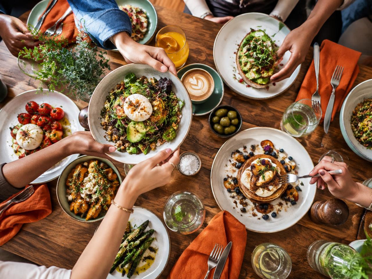 Colourful plates shared across a social brunch table